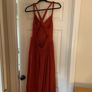 Womens bridesmaid dress, fits size 12-14. Color: rust. Great condition.